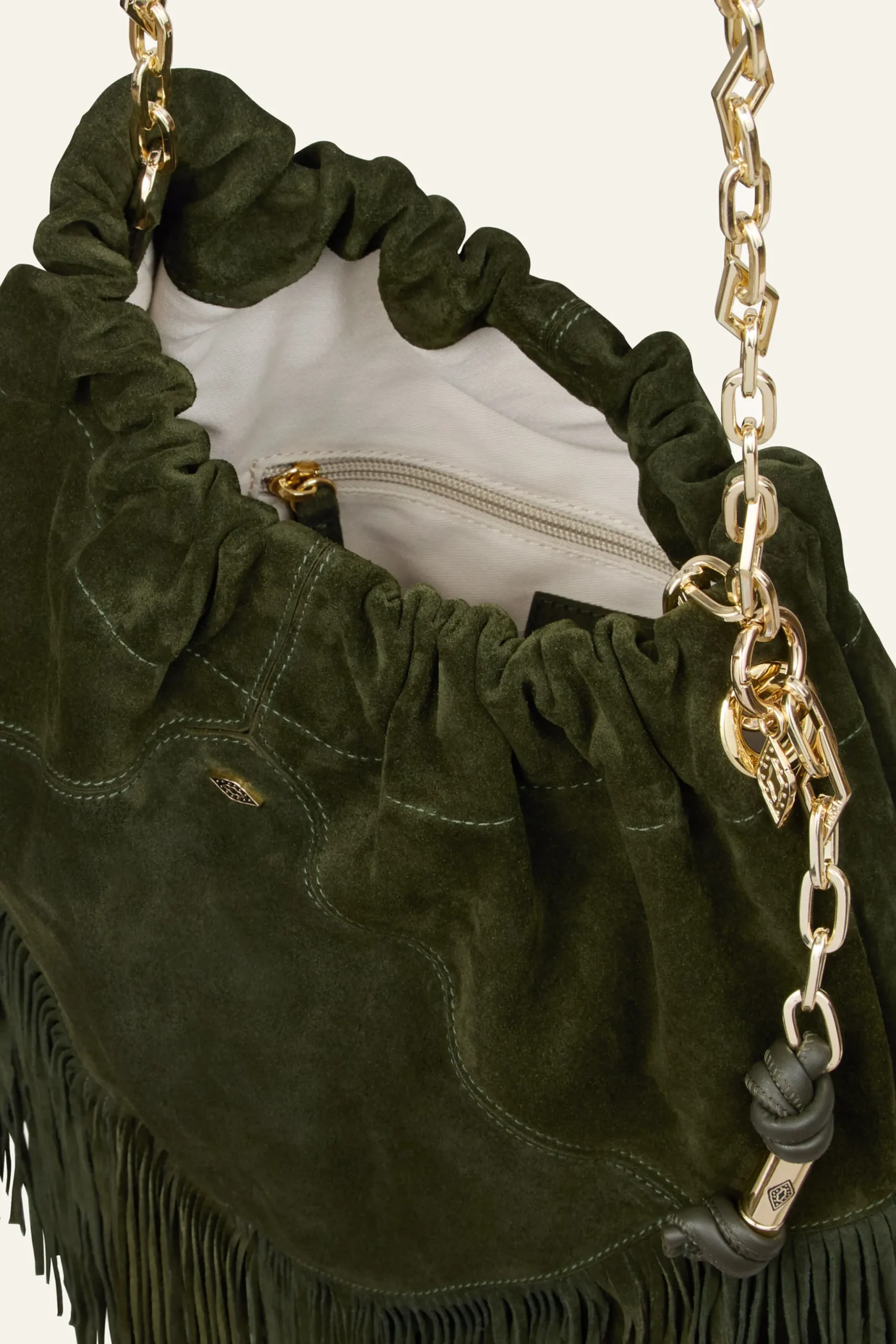 JUNE sac daim franges 450 €
